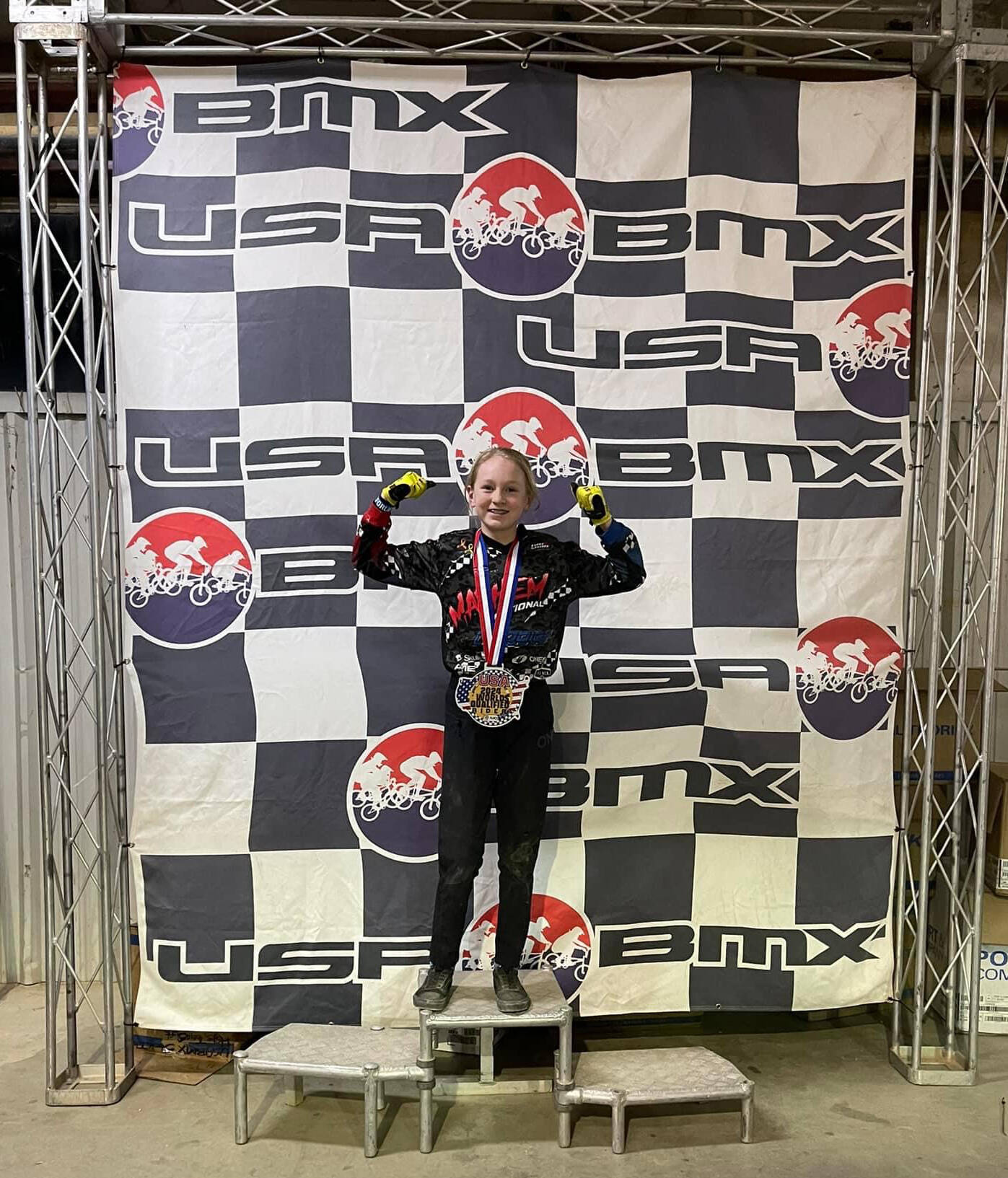 Photo courtesy of Lincoln Park BMX / Teyah Elofson-Cross, 11m of Port Angeles, celebrates a successful weekend at the Blue Ridge National in Lexington, Virginia, in early February.
