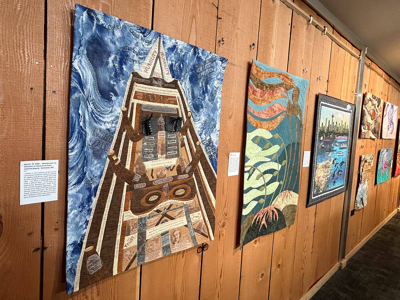 Sequim Gazette photo by Matthew Nash
“Against all Odds: Abandonment to Olympian, A Tribute to Joe Rantz” by Catherine Bilyard is one of 41 quilts on display in Sequim Museum & Arts through the end of March as part of the “Inspiration/Exploration” exhibit.