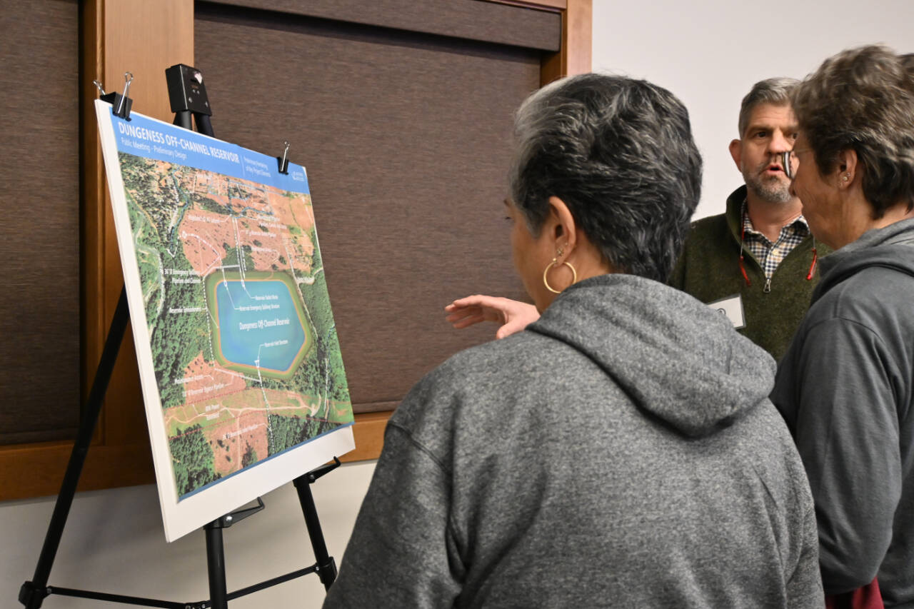 Sequim Gazette file photo by Michael Dashiell 
Clallam County commissioner Mark Ozias talks about aspects of the Dungeness Off-Channel Reservoir to attendees of an open house at the Dungeness River Nature Center in December 2022.