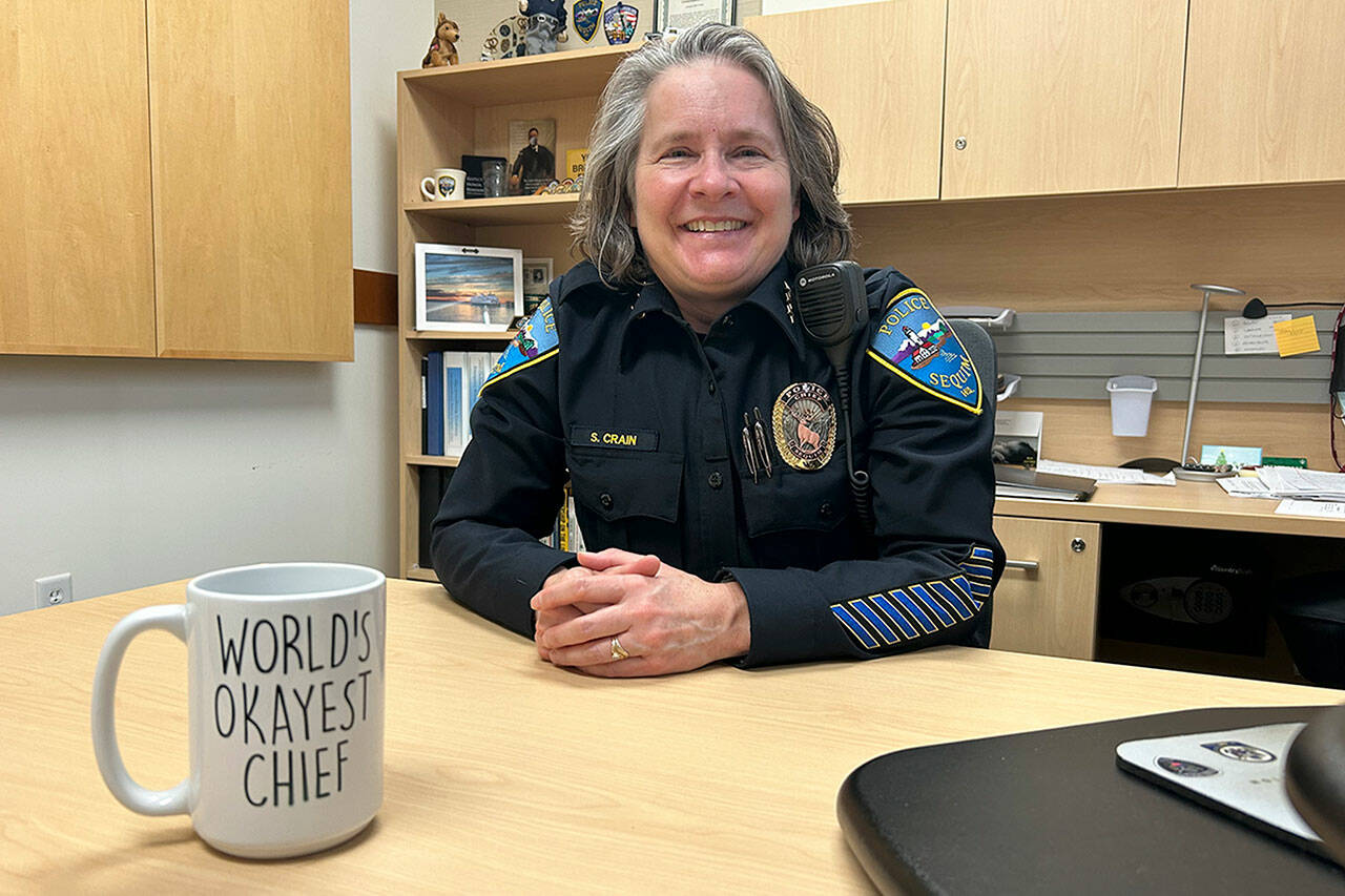 Sequim Gazette photo by Matthew Nash
Sequim Police Chief Sheri Crain sits in her office a week before her retirement on Feb. 29 after 33 years as an officer in Sequim. “I can’t tell you how proud I am to have worked for the City of Sequim this entire time,” she said at a Feb. 26 city council meeting. “This city has developed into a jewel.”