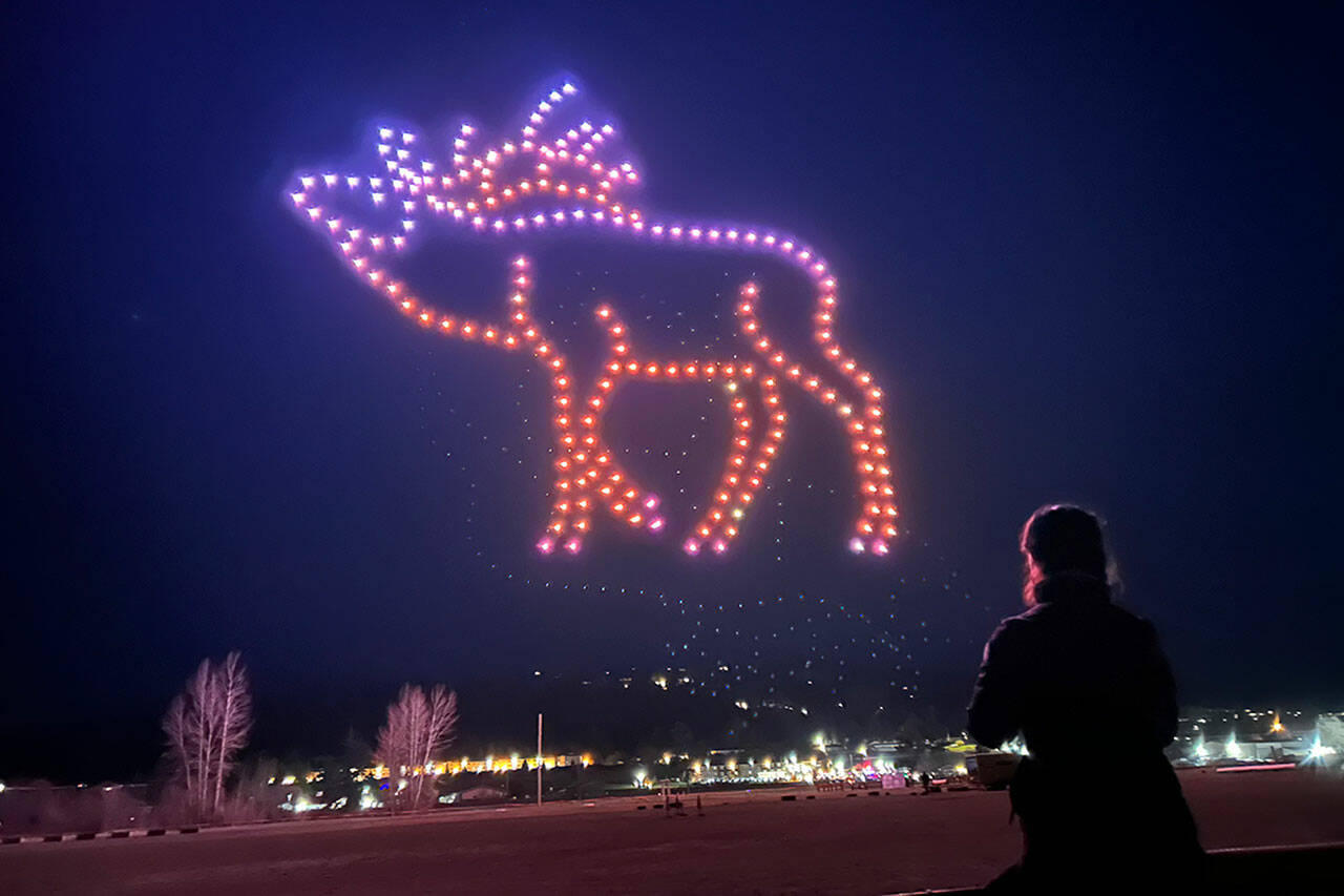 Sequim Gazette photo by Matthew Nash / Attendees enjoy a drone show that capped events at the 2024 Sequim Sunshine Festival on March 2.