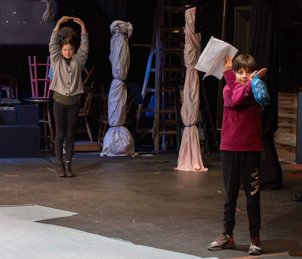 Photo by Emily Matthiessen / Arwen Osborne, left, and Julian Medlong play a giant game of tic-tac-toe to learn stage locations during the two-week OTA theater camp that sets the stage for three public “Plays From African Folktales” performances at the Sequim theater.