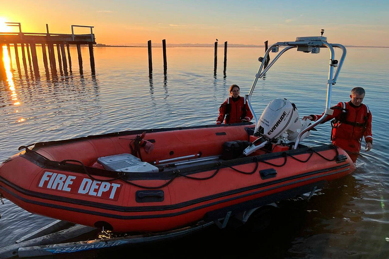 Photo courtesy Jeff Albers, Clallam County Fire District 3
Firefighter/paramedic Liz Hagaman and Capt. Kjel Skov with Clallam County Fire District 3 ready Marine 34 to drive out to the Dungeness Spit on April 13 to rescue an injured hiker as he was unable to make it back to the Dungeness Recreation Area.