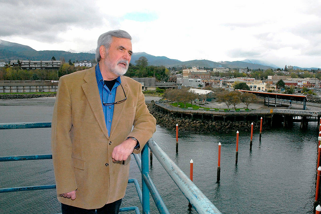 File photo by Keith Thorpe/Olympic Peninsula Daily News Group / John Brewer, former publisher of the Peninsula Daily News, Sequim Gazette and Forks Forum, is pictured here for a PDN story about Clallam County Community Service award recipients in 2018. Brewer died while on a fishing trip in Montana on April 19.