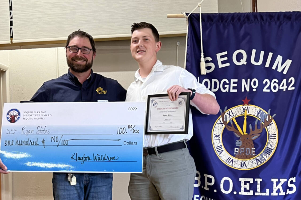 Photo courtesy of Sequim Elks Lodge / Ryan Stites, right, accepts his April 2024 Student of the Month honor from Sequim Elks Exalted Ruler Klayton Waldron.