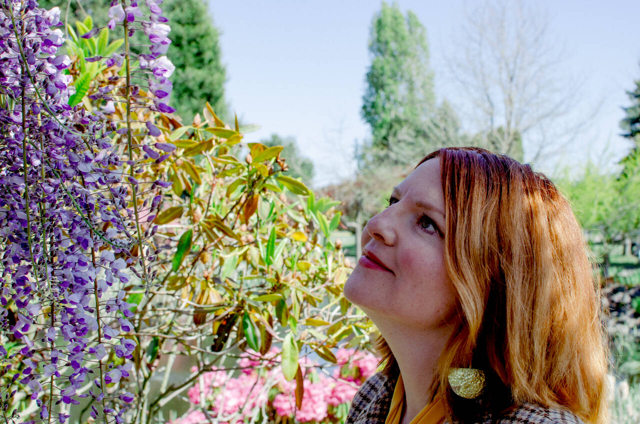 Sequim Gazette photo by Elijah Sussman / Local jazz singer Sarah Shea enjoys a sunny afternoon at Carrie Blake Community Park in early May.