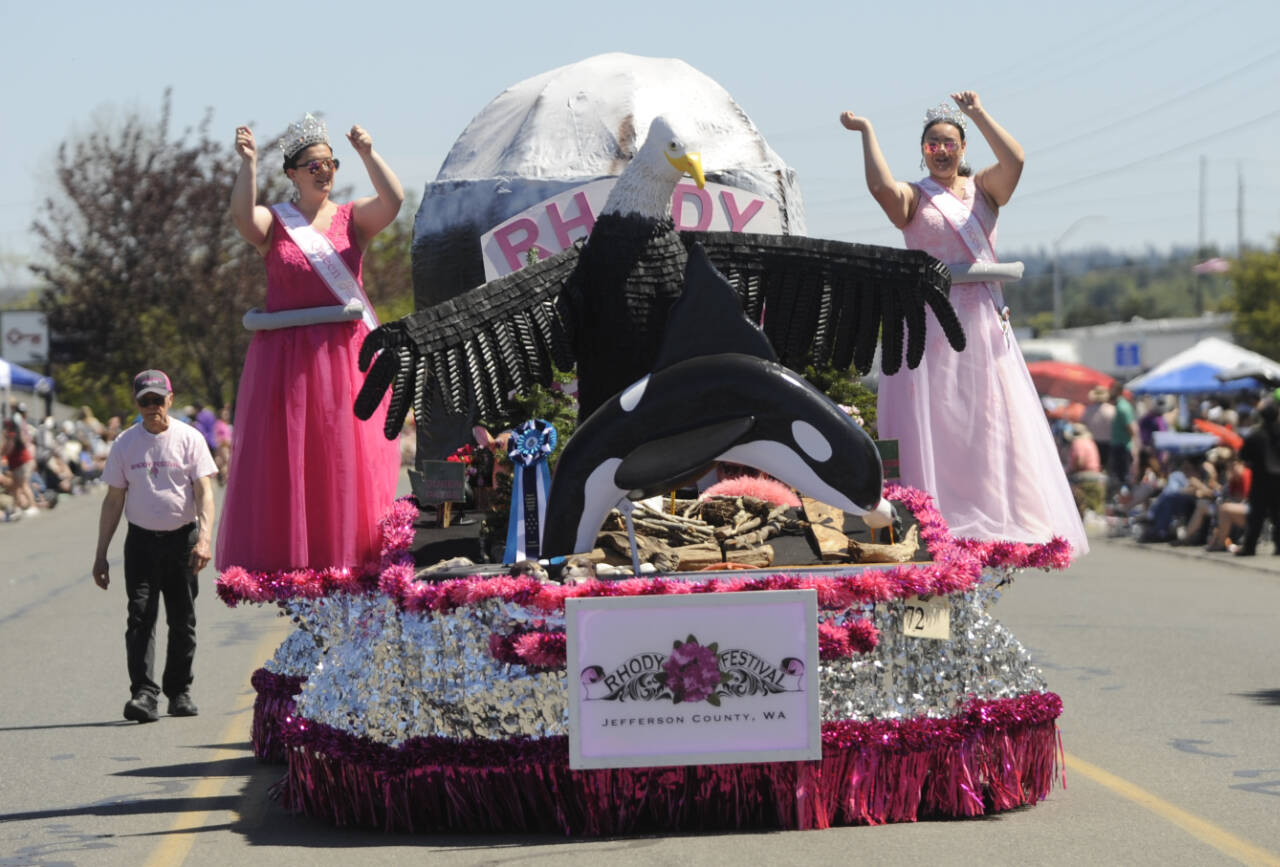 Sequim Gazette photo by Michael Dashiell 
Rhododendron Festival queen Paige Govia and princess Rosie Schmucker wave to the Sequim Irrigation Festival Grand Parade crowd on May 11. The entry took home the festival’s Grand Sweepstakes honor.