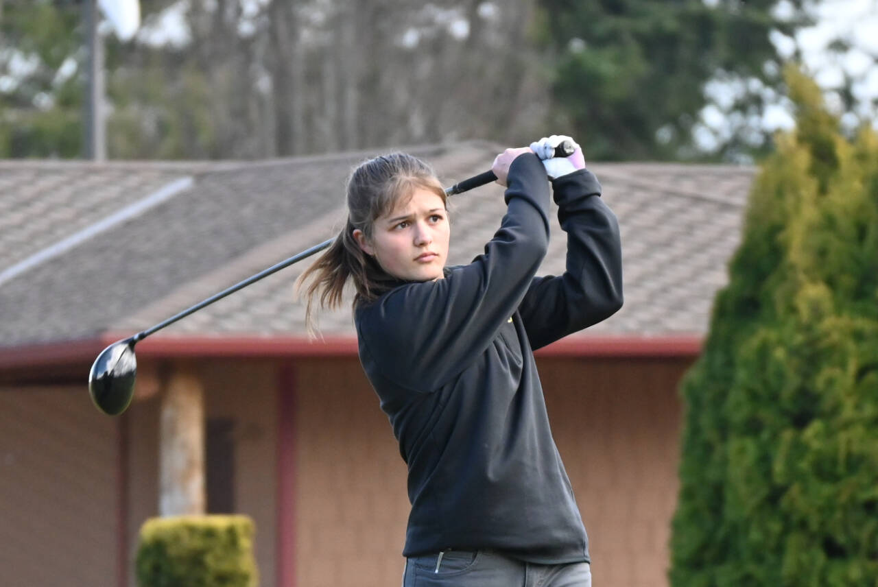 Sequim Gazette file photo by Michael Dashiell
Sequim’s Raimey Brewer tees off at the first hole at The Cedars at Dungeness in an Olympic League match against Bainbridge on March 21. Brewer qualified for the class 2A state golf tournament at a district tournament last week in Auburn.