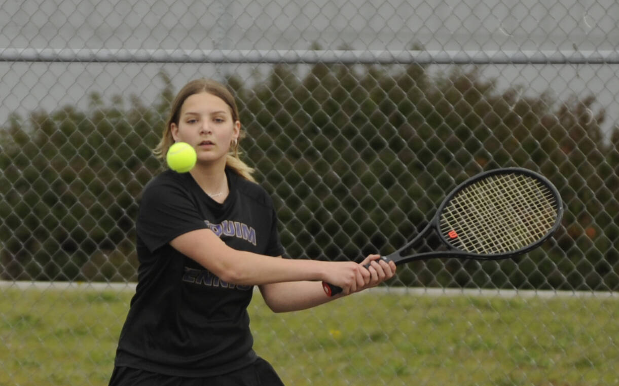 Sequim Gazette photo by Michael Dashiell / Sequim’s Calleigh Thompson returns a shot in a match against Olympic on April 21. Thompson placed fourth at the West Central Bi-District tourney this past weekend and advances to the class 2A state tourney in Seattle that starts May 24.