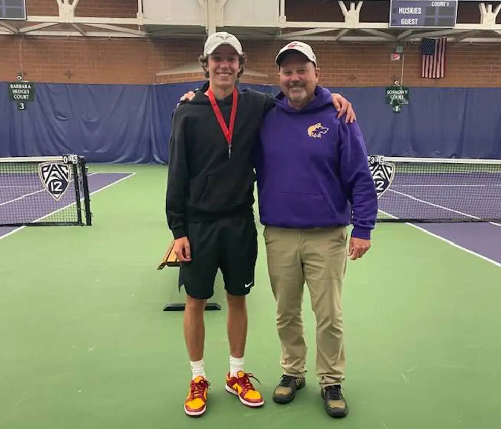 Photo courtesy of Caryn Little
Sequim’s Garrett Little, left, celebrates a second place finish at the 2A state tennis tournament in Seattle this past weekend with Sequim head coach Mark Textor.