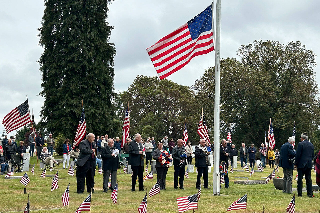 Sequim Gazette photo by Matthew Nash
Members of the Veterans of Foreign War Post 4760 and American Legion Jack Grennan Post 62 hold a Memorial Day ceremony on May 27 in Sequim View Cemetery honoring those lost while serving in the U.S. armed forces. It was one of five ceremonies held in the Sequim area between the two groups on the annual day of remembrance. See story, A-10.