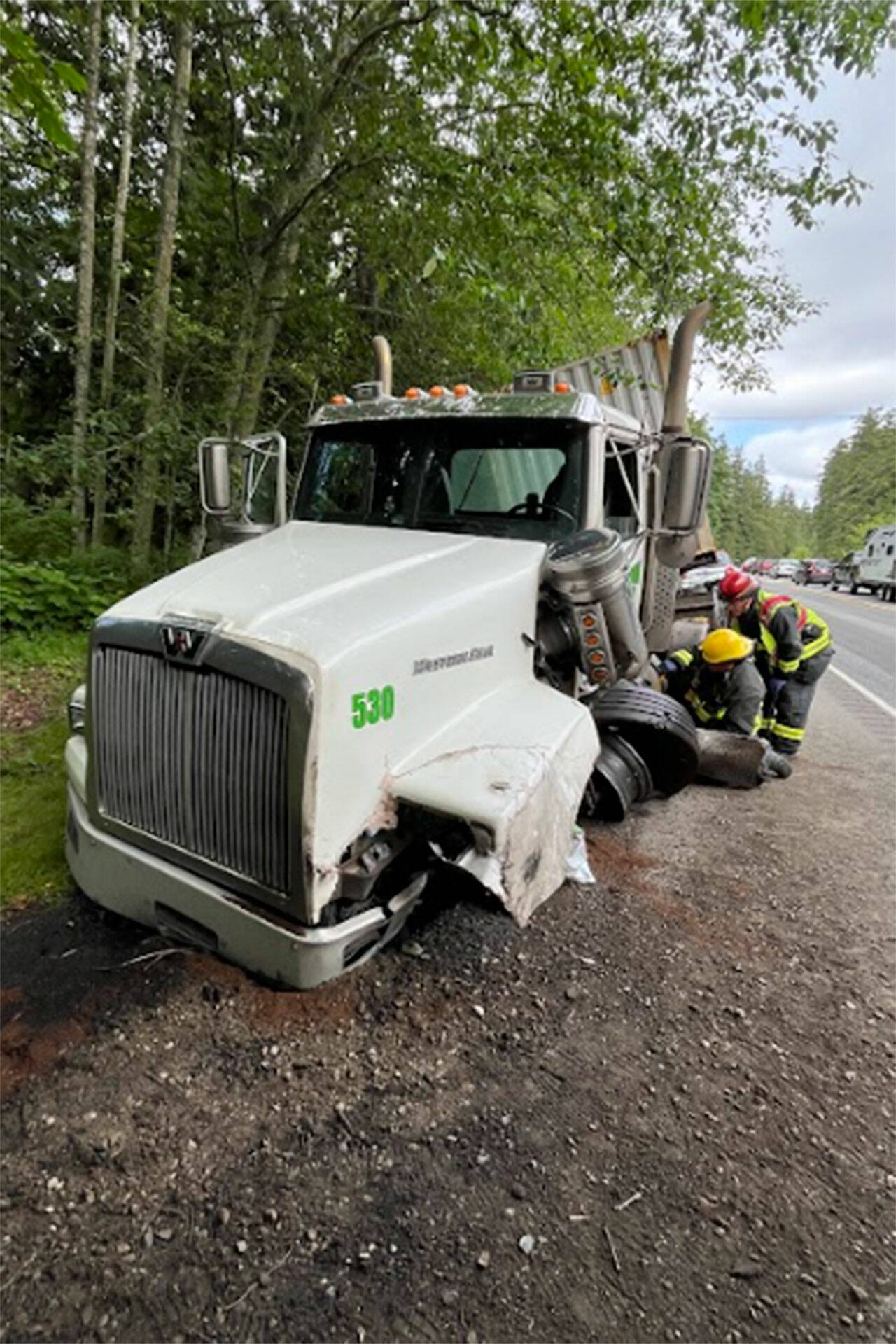 Photo courtesy Clallam County Fire District 3/ Three people were transported to area hospitals for injuries on Monday, June 17 after a collision on U.S. Highway 101 that involved two SUVs and a semi-truck.