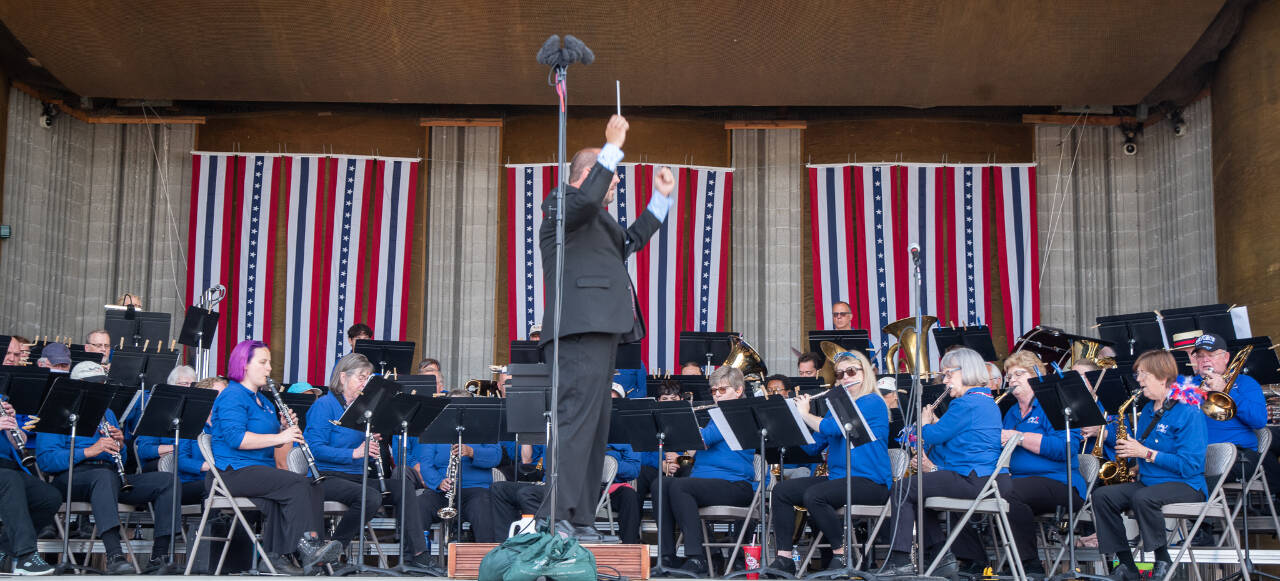 Sequim Gazette file photo by Emily Matthiessen / Tyler Benedict leads the Sequim City Band at last week’s Independence Day concert in 2023.