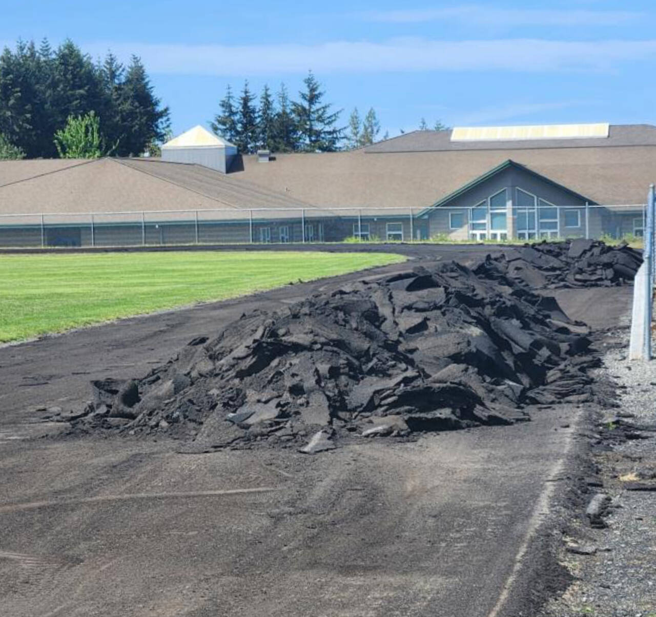 Photo courtesy of Sequim School District / Mike Santos, the Sequim School District’s Director of Facilities, Operations and Security, said about three times the normal amount of material from track resurfacing was pulled from Sequim’s stadium this summer, made mostly of compacted rubber from old tires.