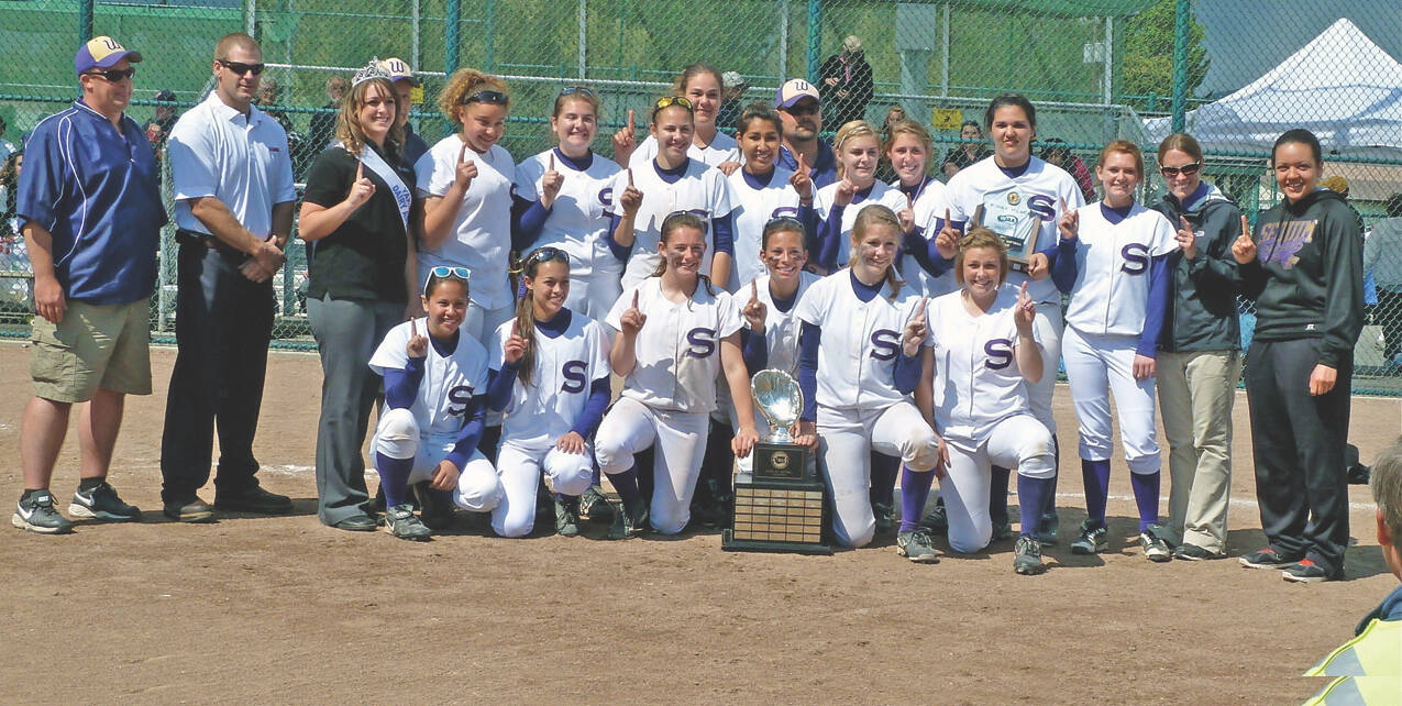 Photo by Lisa Jensen / Sequim High’s fastpitch squad celebrates a state 2A title in 2011.