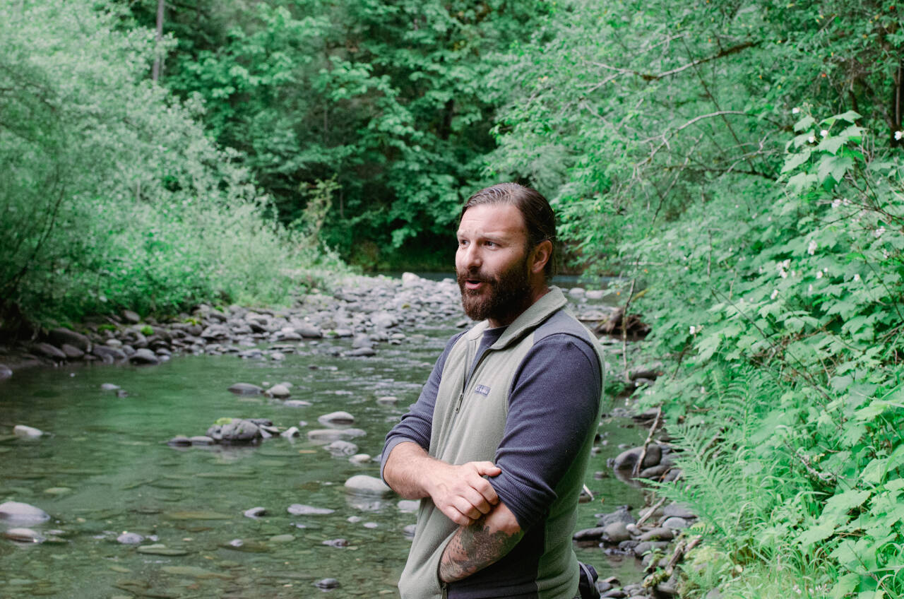 Sequim Gazette photo by Elijah Sussman / David Brownell stands near a side channel of the Dungeness River on June 28.