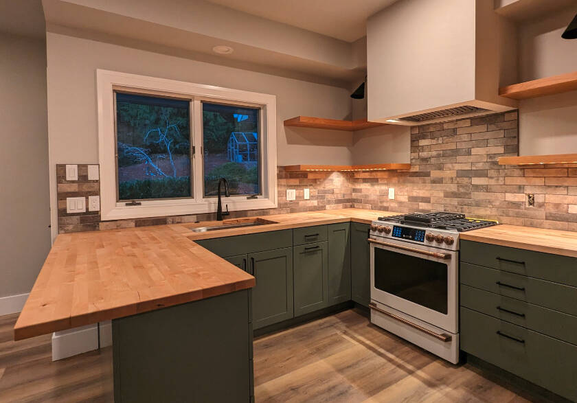 Photo courtesy of Titan Builders / The Sequim-based Titan Builders’ remodel of this Sequim home earned the company a Building Industry Association of Washington (BIAW) Excellence in Remodeling Awards honor in the Kitchen $45,001-$75,000 division, the association announced on July 9. Pictured here is the remodeled kitchen after the project.