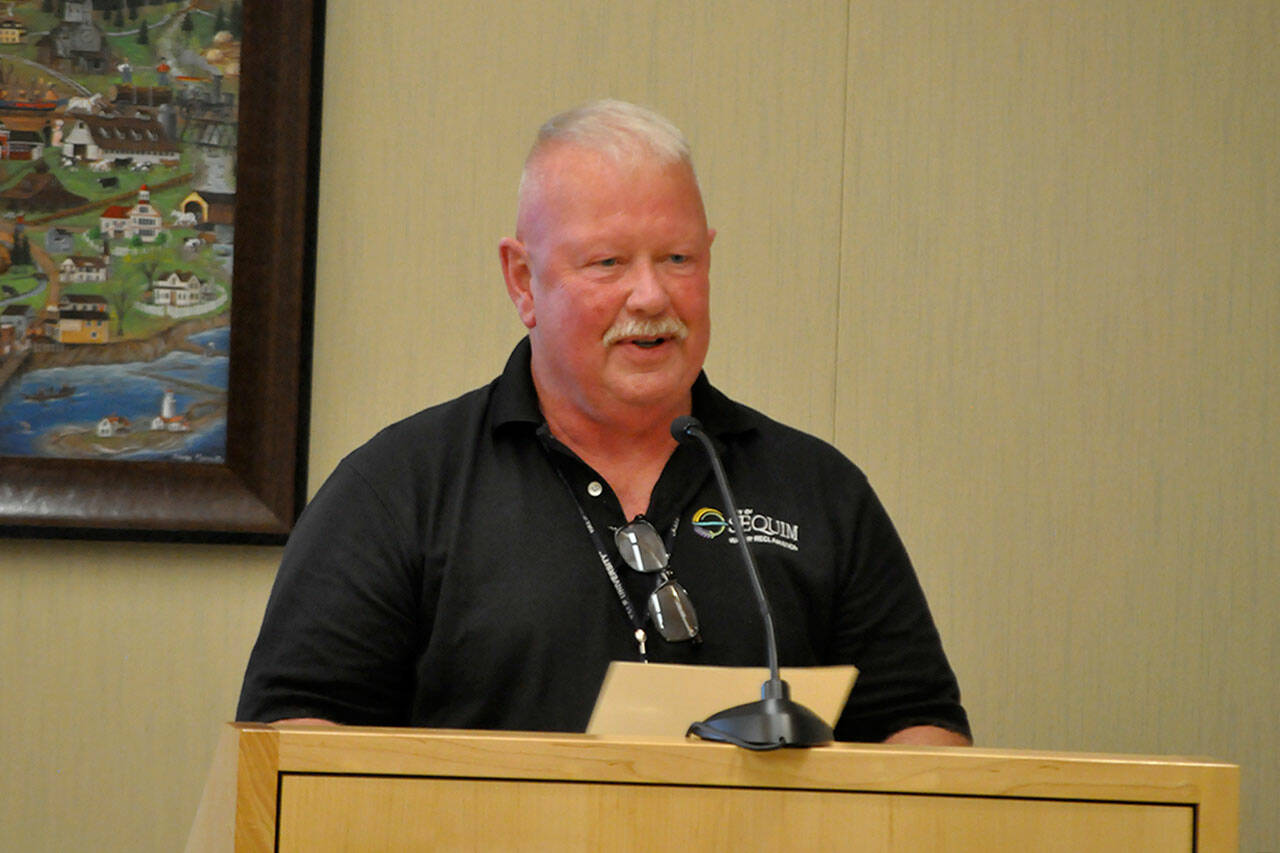 Sequim Gazette photo by Matthew Nash/ Pete Tjemsland, retiring City of Sequim utilities manager, was acknowledged on June 24 for his 35 years serving the city with a proclamation from city councilors and mayor Brandon Janisse.