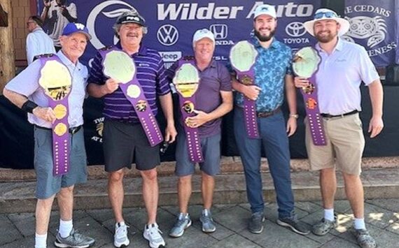 The winners of the 13th annual Sonny Sixkiller Huskies Celebrity Classic at Cedars at Dungeness. From left, Ed Cribby, Mark Mitrovich, Bob Mathews, Hunter Larson and Nick Larson played on the D.A. Davidson team. (Courtesy photo)