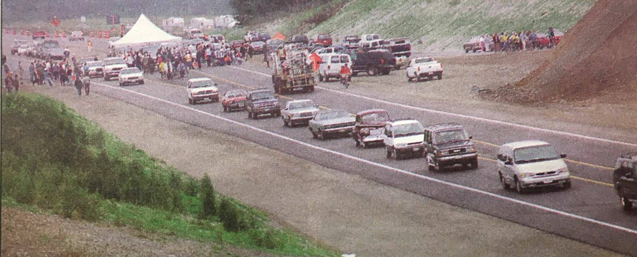 Sequim Gazette file photo / Various vehicles line up for a ceremony to honor the opening of Sequim’s new bypass in August 1999. Plans were in place to finish the Simdars Road Interchange but state funding led the Department of Transportation to leave the project half finished.