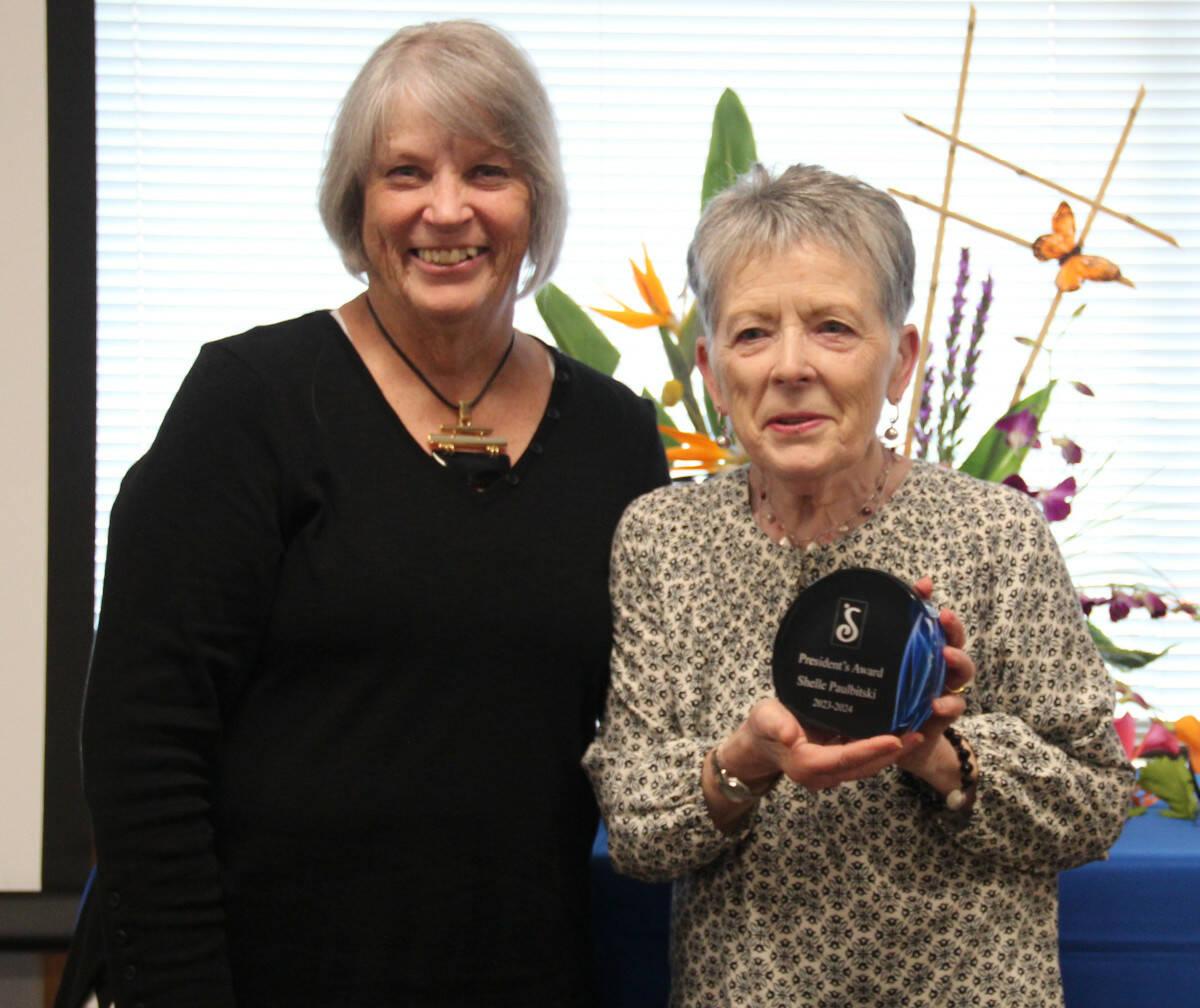 Photo courtesy of Soroptimist International of Sequim
At left, Shirley Legg, Soroptimist International of Sequim’s outgoing president, honors club member Shelle Paulbitski with the organization’s President’s Award.