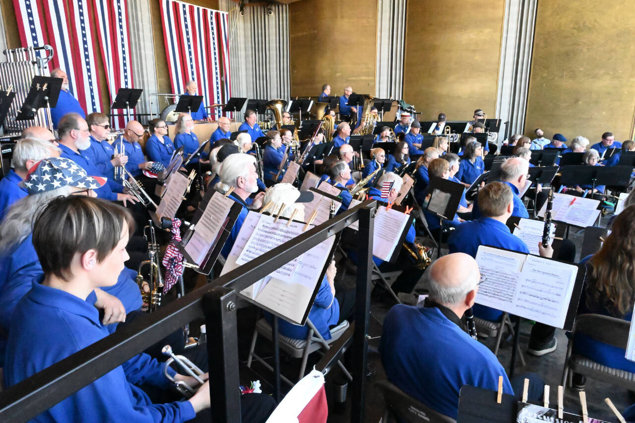 Photo by Richard Greenway/Sequim City Band / Sequim City Band musicians are on stage awaiting the start of the 2024 Independence Day concert in July.