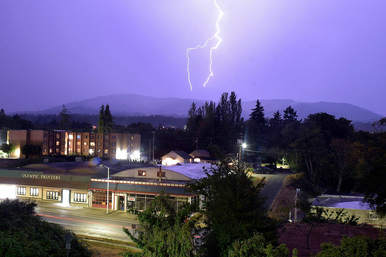 Photo by Keith Thorpe/Olympic Peninsula News Group / Bolts of lighting strike around the rain-obscured Klahhane Ridge area of Olympic National Park south of Port Angeles as thunderstorms work their way across the Olympic Peninsula on Aug. 17. Hundreds of strikes were recorded across the region.