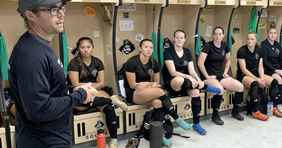 Peninsula College Athletics
Peninsula College head coach Kanyon Anderson speaks to his squad in the women's soccer locker room during the first day of practice earlier this month. Anderson has an experienced cast of 18 sophomores and 11 freshmen on the roster. The 2024 season opens with an Aug. 14 scrimmage at the University of Victoria. The Pirates' first home game is Aug. 27 against Multnomah.