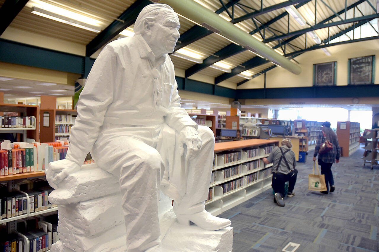 Photo by Keith Thorpe/Olympic Peninsula News Group / A model of a statue of Nisqually tribal activist Billy Frank Jr. by Chinese American sculptor Haiying Wu sits in the Port Angeles Public Library in conjunction with a meeting of the Northwest Indian Fisheries Commission. The model eventually will be cast in bronze and installed in the National Statuary Hall in Washington, D.C. Frank received a posthumous Presidential Medal of Freedom in 2015 for his work in fighting for tribal treaty rights and obligations. The statue will be on display at the library through Aug. 24.