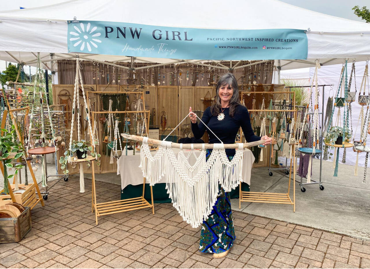 Photo by Layla Forêt
Shelly Weber of PNW Girl offers wall hangings, driftwood dangles woven with seaglass, plant hangers and more at her booth at the Sequim Farmers & Artisans Market.