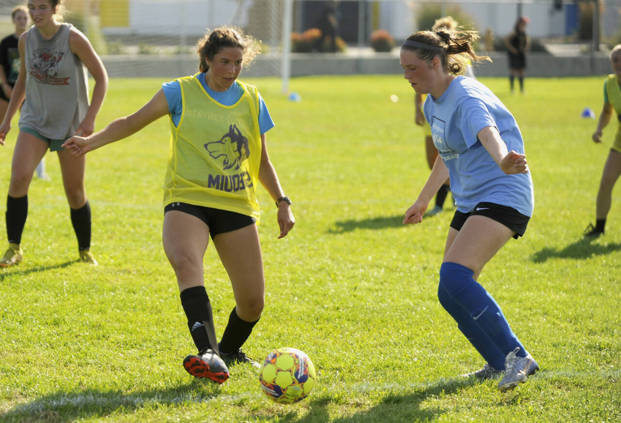 Sequim Gazette photos by Michael Dashiell
Sequim High’s Laila Sundin, left, and Libby Turella vie for possession in a preseason practice last week. The Wolves opened the 2024 campaign against Vashon on Sept. 10.