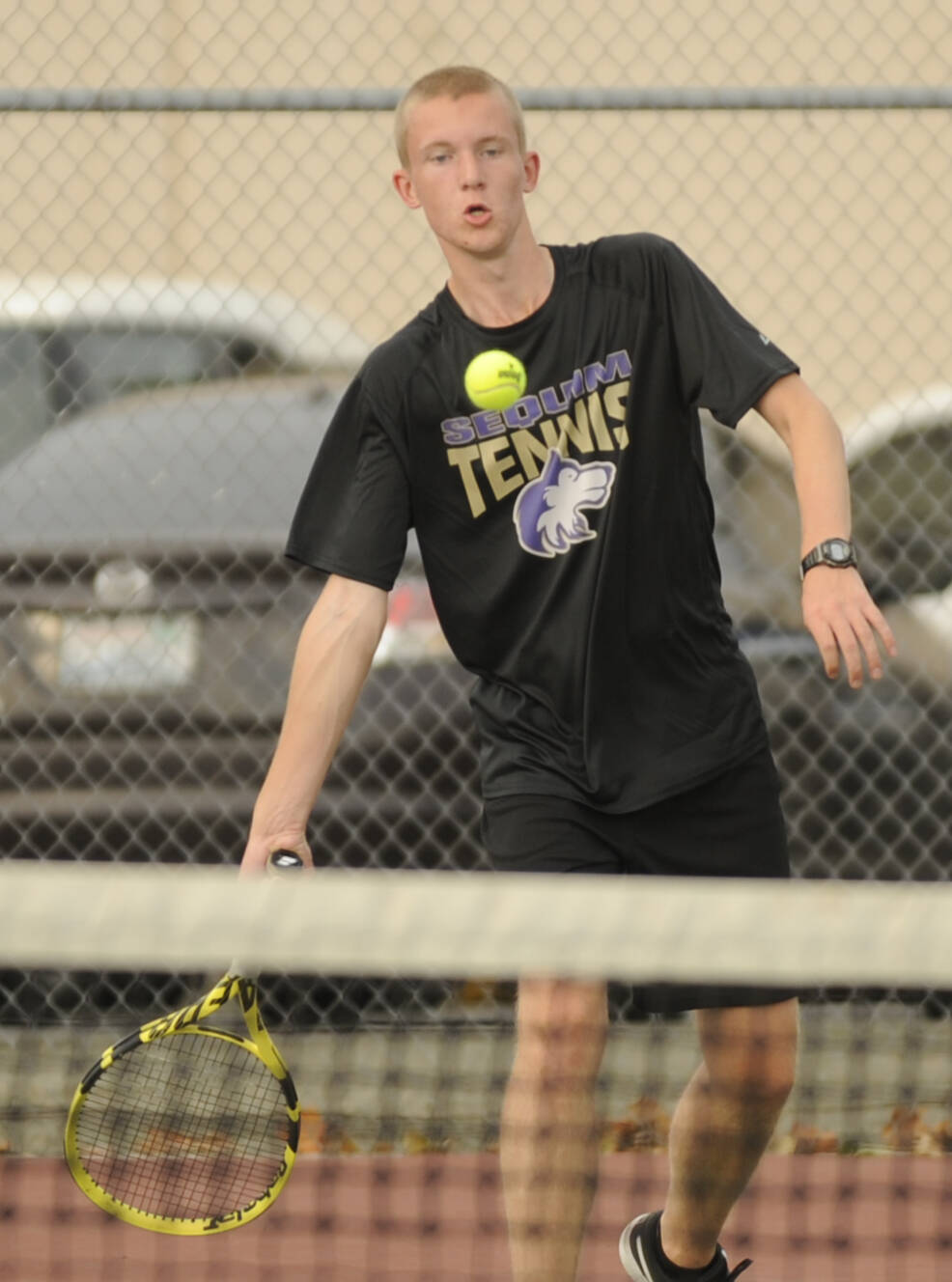 Sequim Gazette file photo by Michael Dashiell / Sequim’s Jack Crecelius takes on Olympic’s Cam Guess in a league match in 2023.