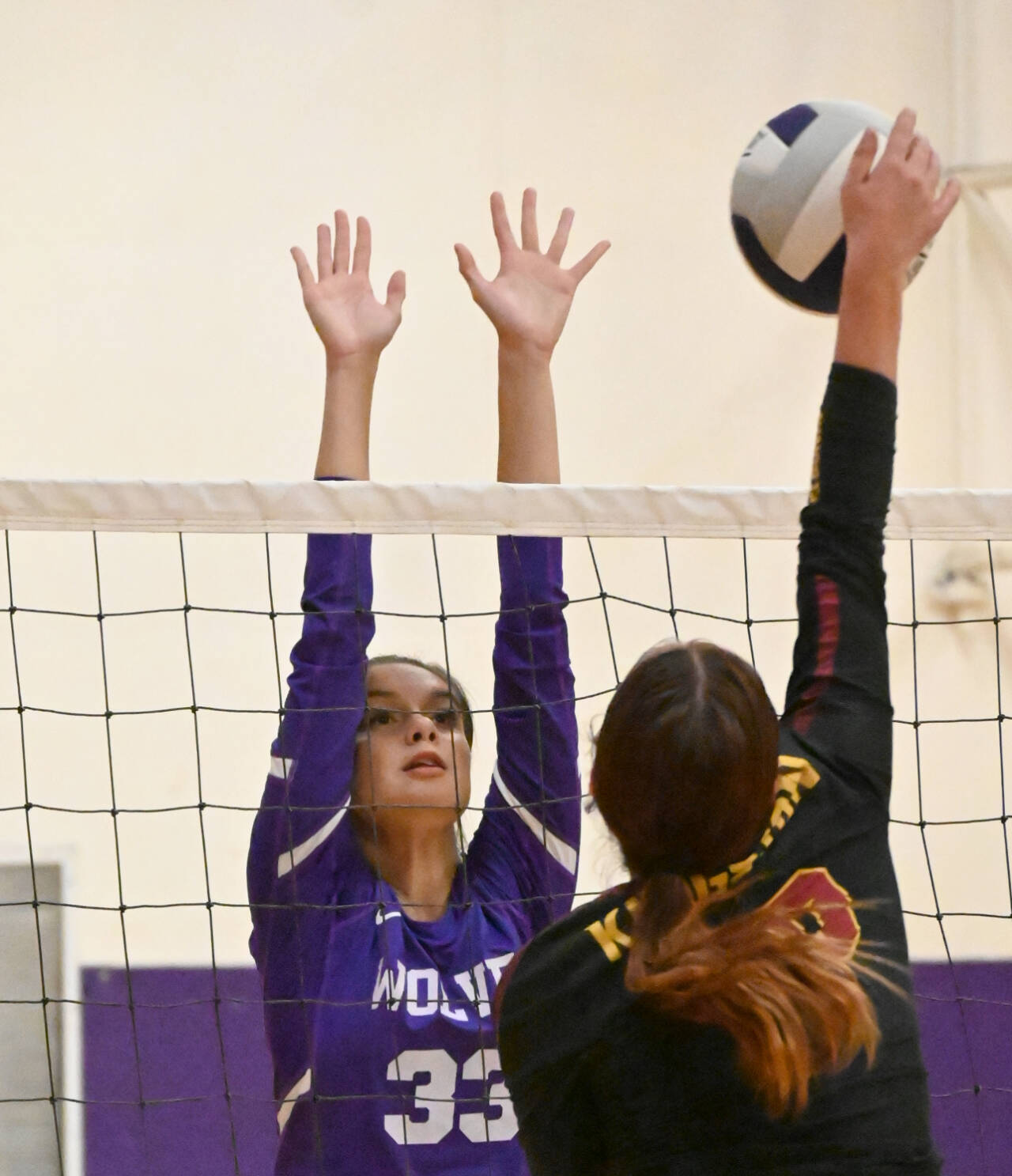 Sequim Gazette file photo by Michael Dashiell 
Sequim’s Arianna Stovall, left, looks to block a shot by Kingston’s Lucy Patricio in an Olympic League match-up in October 2023. Stovall is one of two returning seniors on the 2024 SHS squad.