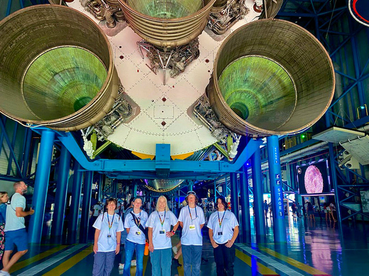 Photo courtesy Sara Turner
Standing below the Saturn V rocket, Sequim students and teacher, from left Megan Reeves, Allee Deering, Sara Turner, Riley Guimond, and Olivia Lozano enjoy a tour of the Kennedy Space Center Visitor Complex in August after they won a trip to Florida through their Sequim Middle School club.