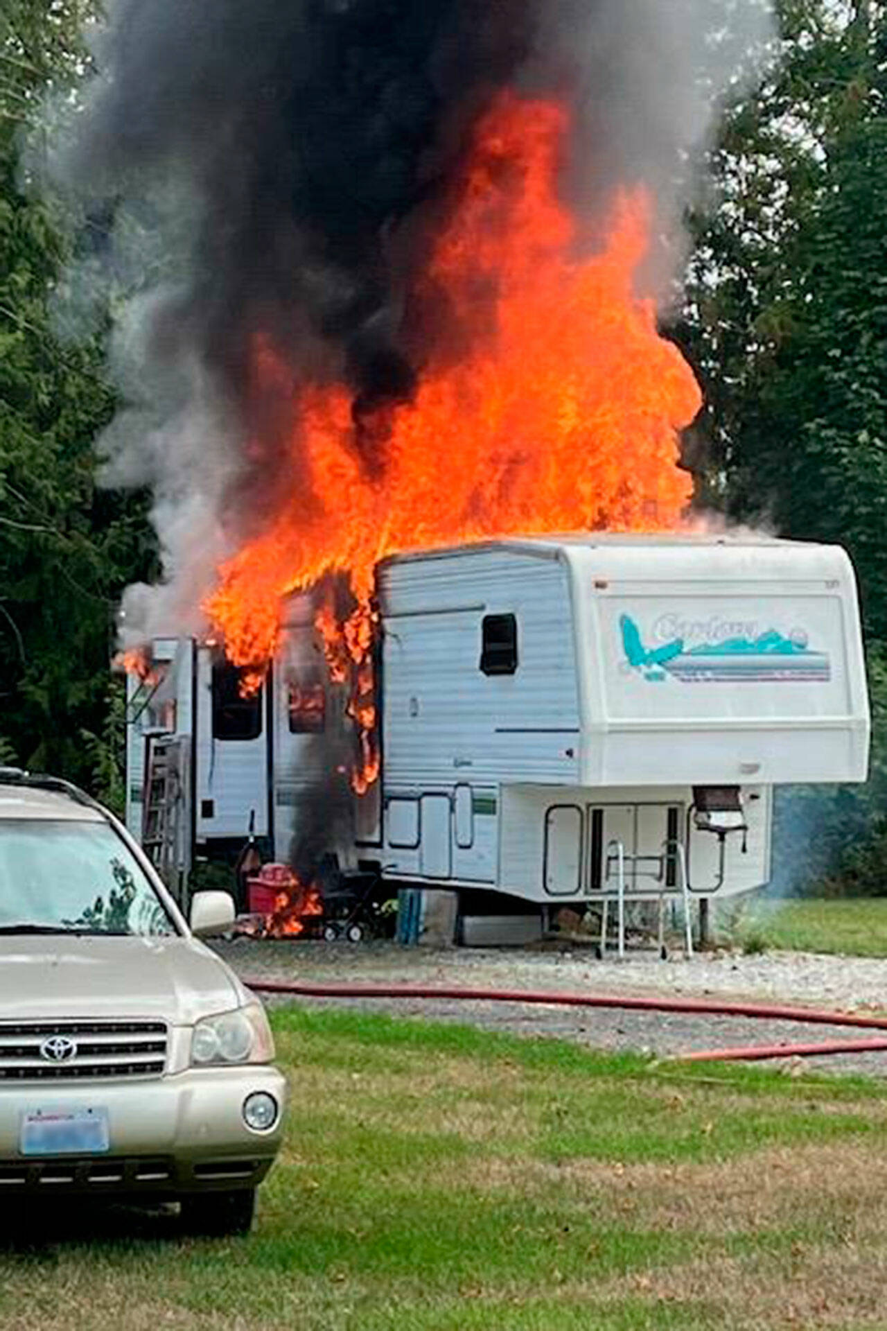 Photo courtesy Chris Turner, Clallam County Fire District 3

Firefighters called for Life Flight on Sept. 13 to take a man to Seattle for burn treatment after an explosion inside his RV in the Sequim area. More than 1,100 gallons of water was used to extinguish the fire, Clallam County Fire District 3 battalion chief Chris Turner said.