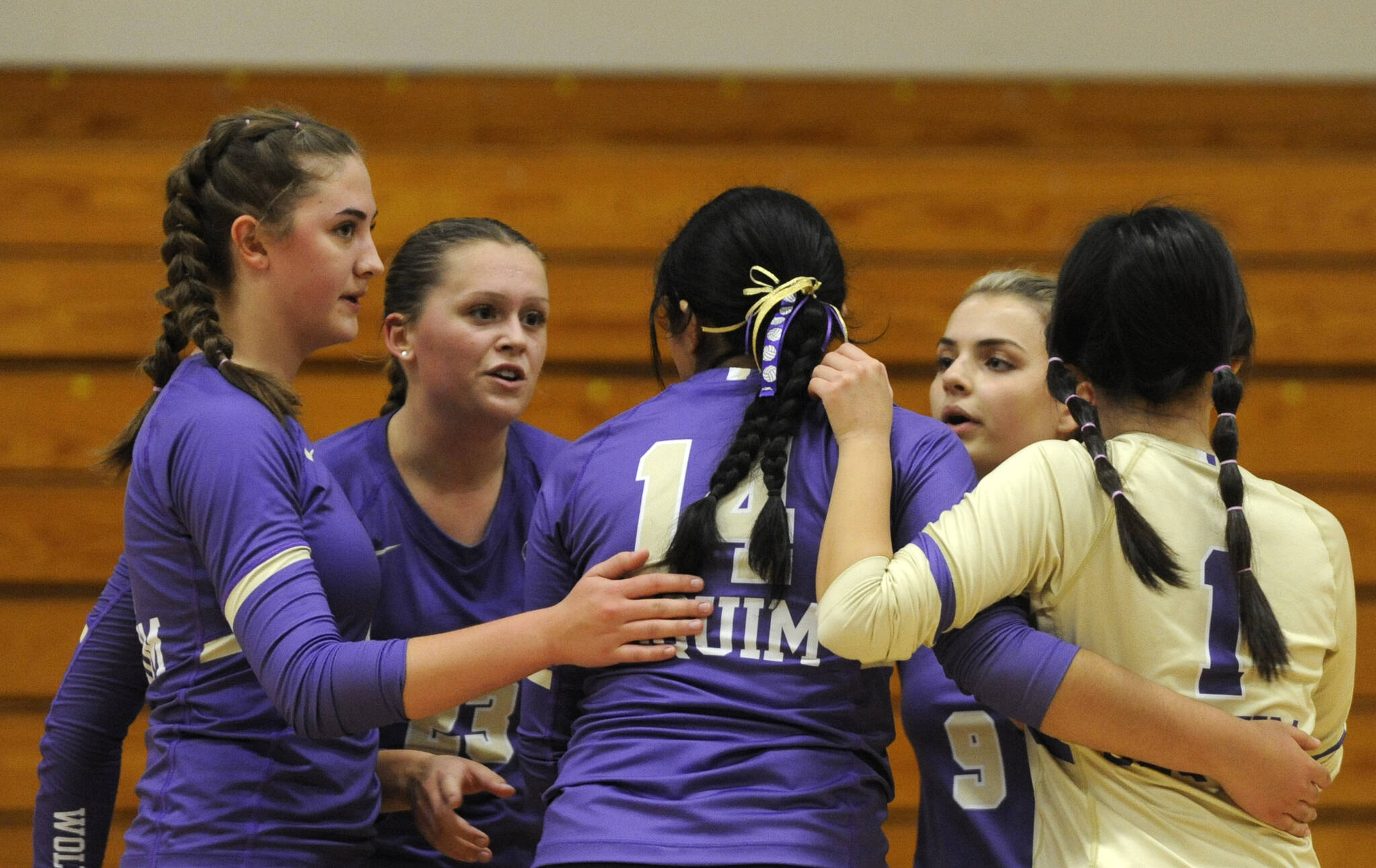 Photo by Michael Dashiell, Sequim Gazette / Sequim players gather after losing a point to Bainbridge in the third set of an Olympic League match on Sept. 19. Pictured in the photo are, from left, Rose Gibson, Kenzi Berglund, Kassi Montero, Sophia Greenleaf and Tiffany Lam.