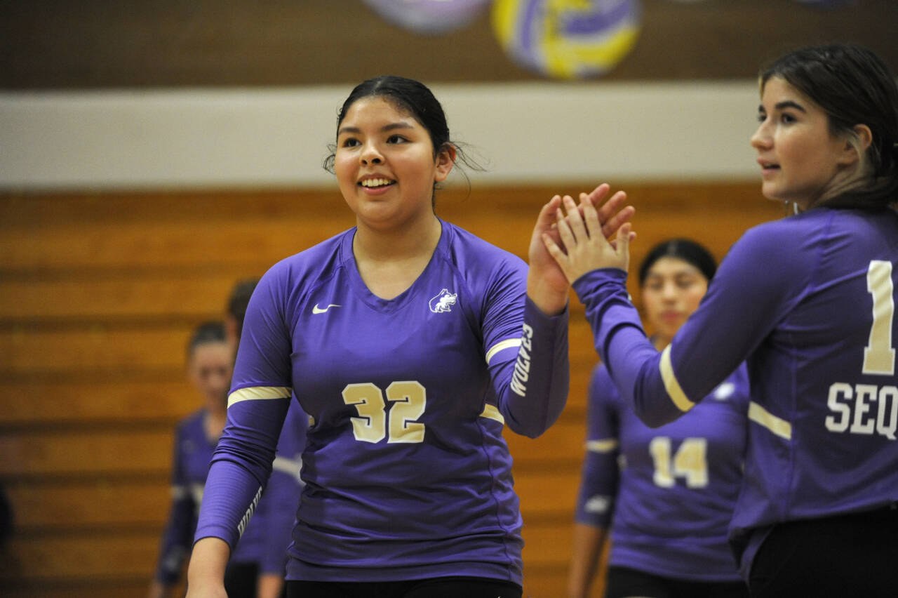 Sequim Gazette photo by Michael Dashiell / Yzzy Montero of Sequim is all smiles after a tough game in the third set of an Olympic League match against Bainbridge on Sept. 19.