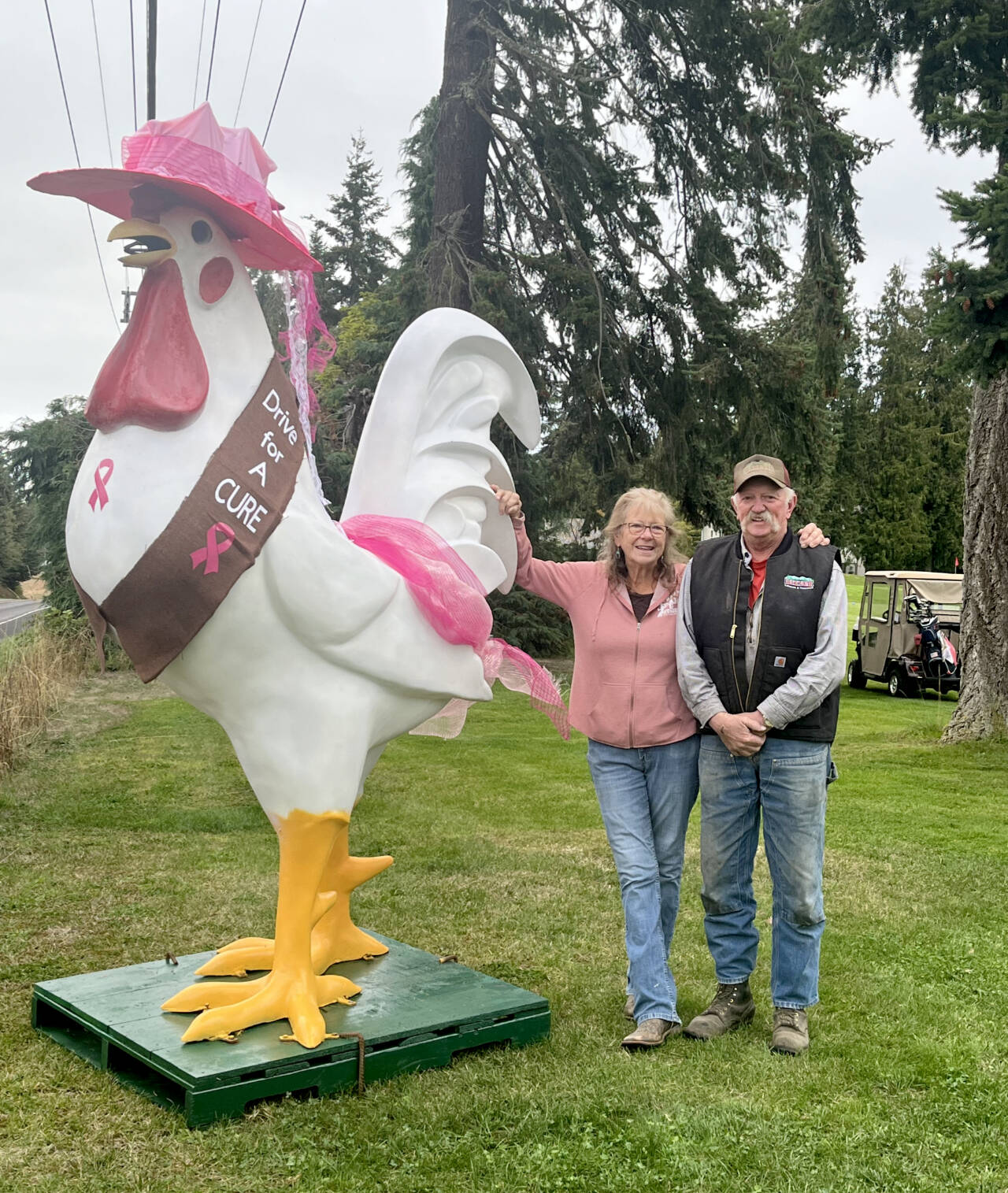 Photo courtesy of Bekkavar family
Trish and Dave Bekkavar loaned their giant rooster to the Sunland Women’s Golf Club to help the group fight cancer at their tournament on Sept. 21. People can make their check out to the Olympic Medical Center Foundation and drop it off at the Sunland Pro Shop or mail it to: Sunland Golf Club, 109 Hilltop Drive, Sequim, WA 98382.