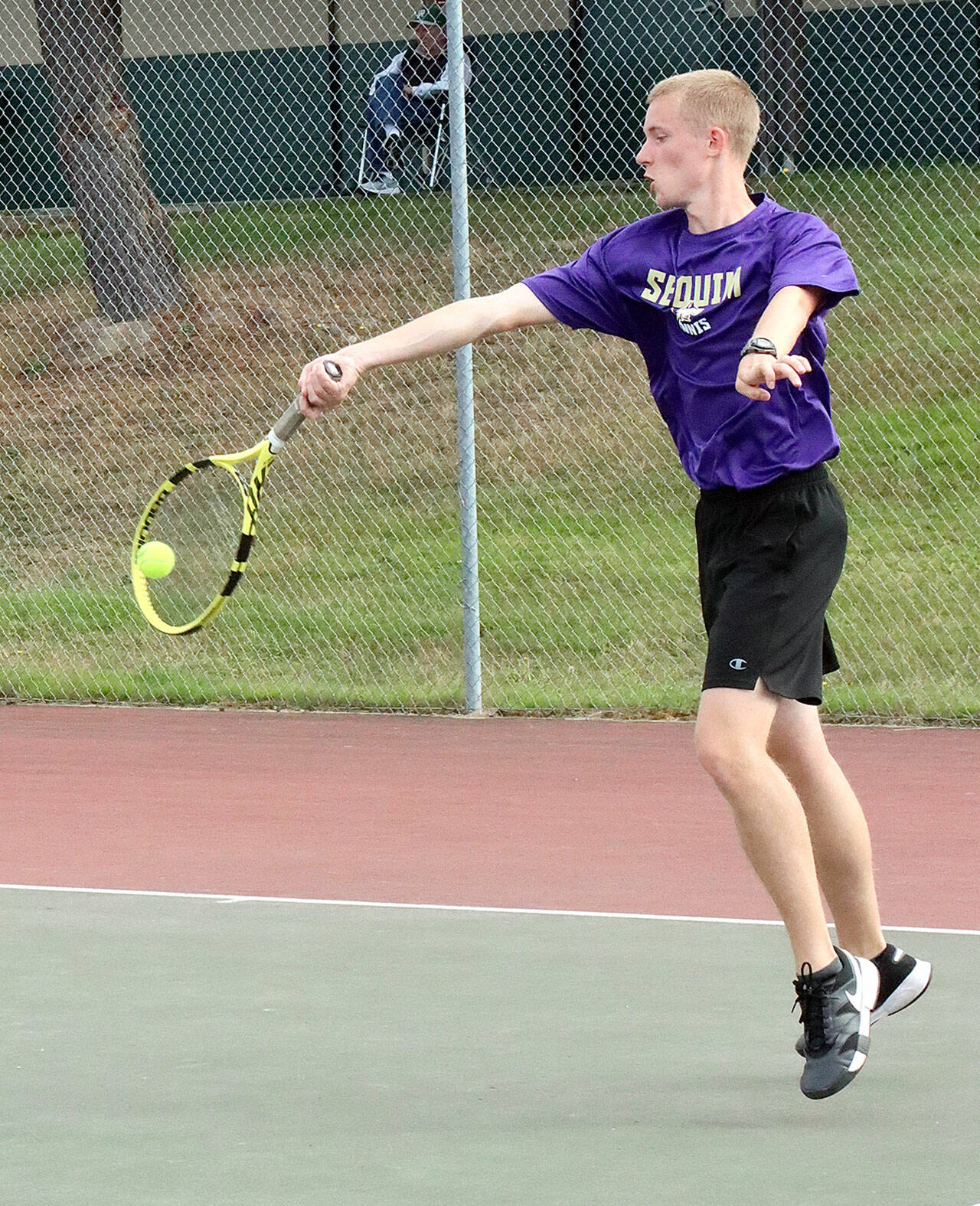 Photo by Dave Logan/for Olympic Peninsula News Group
Sequim’s No. 1 singles player Jack Crecelius returns a volley against Port Angeles’ Tate Alton on Sept. 23.