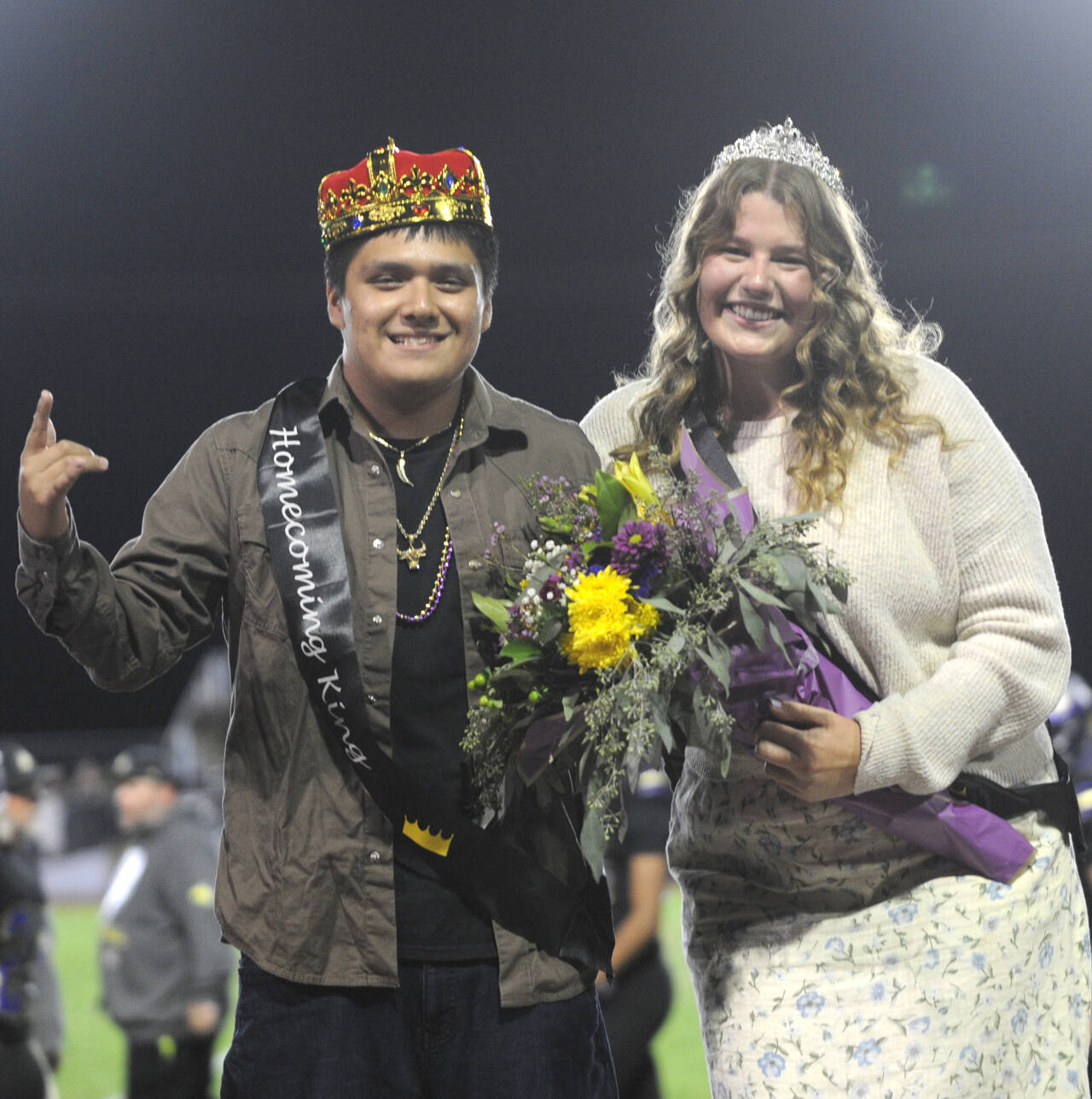 Sequim Gazette photo by Michael Dashiell / Sequim High School celebrated their Homecoming — and Homecoming royalty — at halftime of the Sept. 27 football game against rival Port Angeles. The Wolves topped rival Port Angeles 27-7 in their annual Rainshadow Rumble game. Pictured are Homecoming King Israel Torres and Queen Paige (Skylar) Krzyworz.