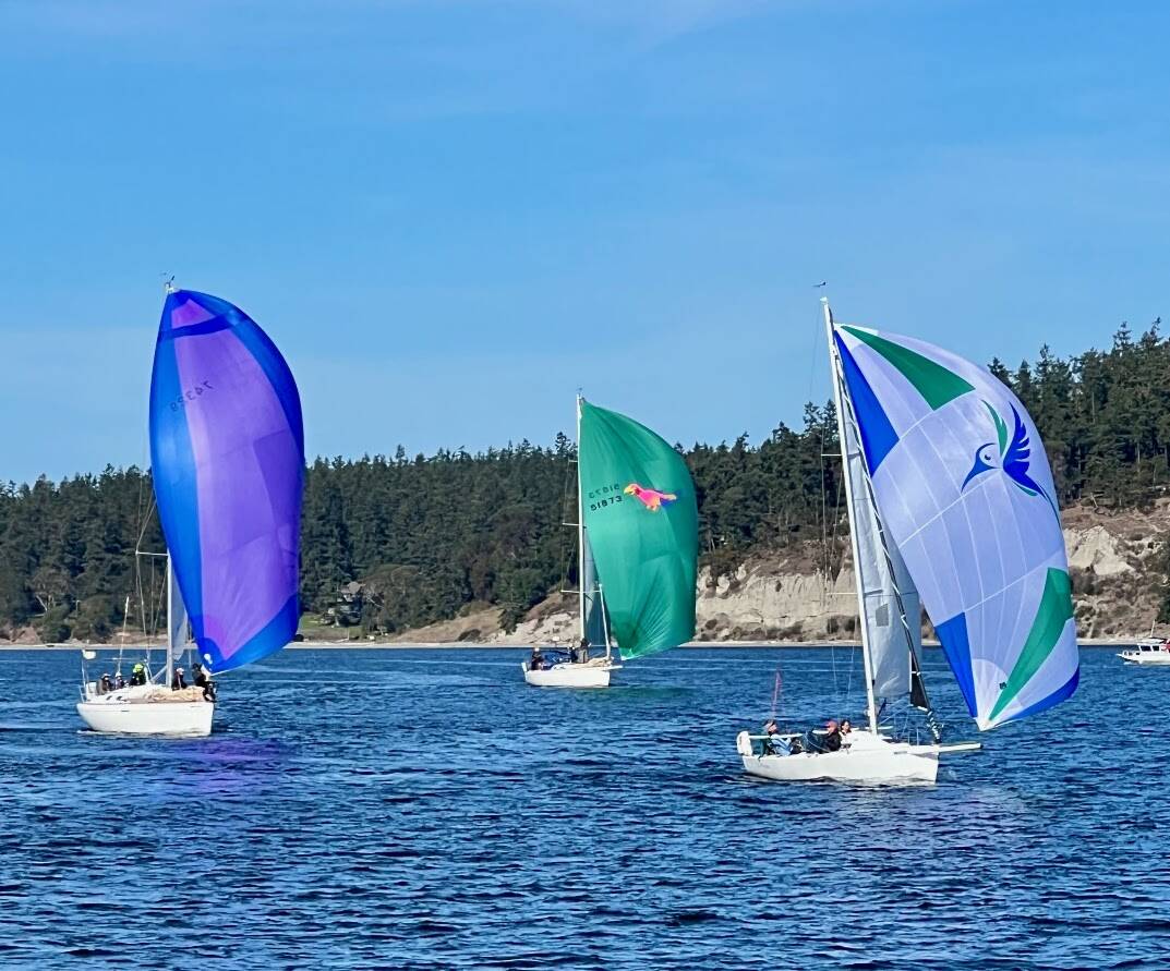 Photo courtesy of Sequim Bay Yacht Club / Racing in the Reach & Row for Hospice sailing regatta on Sequim Bay on Sept. 21 are WindChild, Jomo and Litonya.