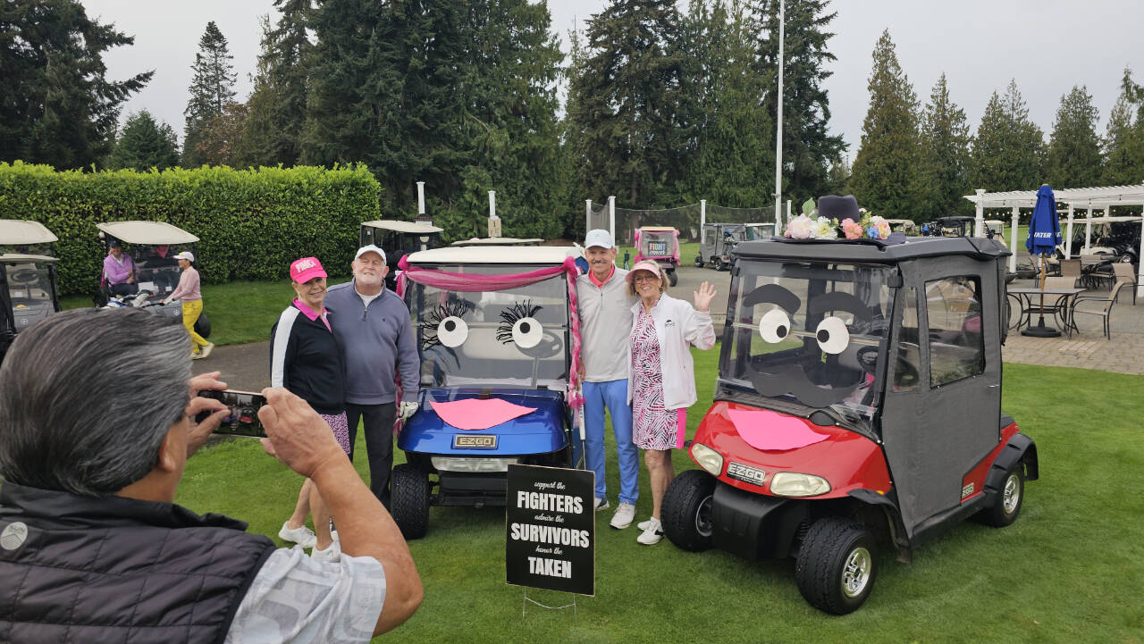 Photo courtesy of Sunland Women’s Golf Association
At left, Bill Alcayaga gets a photo of Drive for the Cure Tournament participants (from left) Judy Flanders, Phil Turner, Jay Tomlin and Cheryl Coulter.