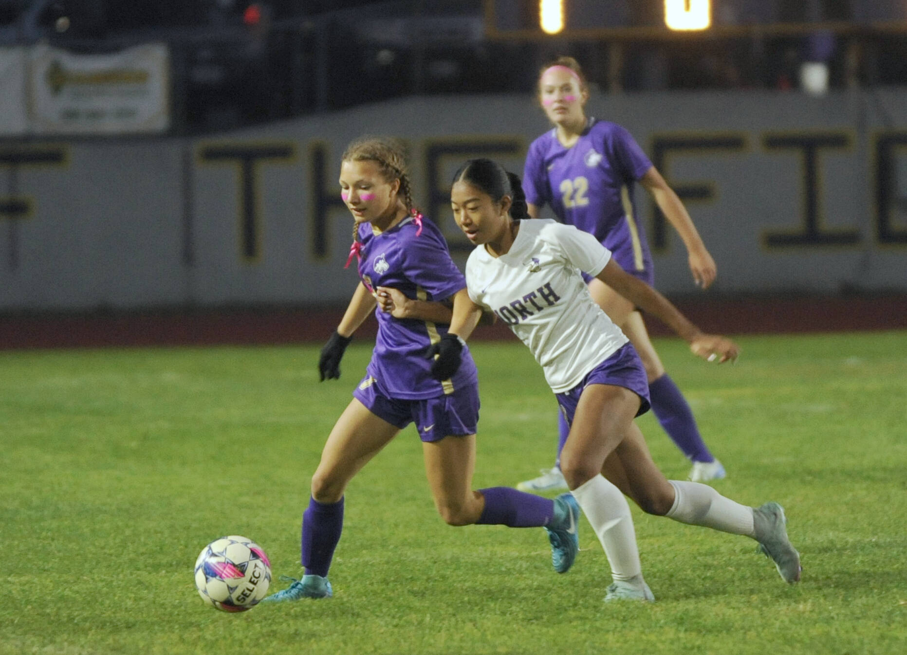 Sequim Gazette photo by Michael Dashiell / Sequim’s Kiley Winter, left, battles a North Kitsap player for possession in SHS’s 1-0 loss to No. 7-ranked NK at home on Oct. 1. SHS’s Hailey Wagner (background) looks on.