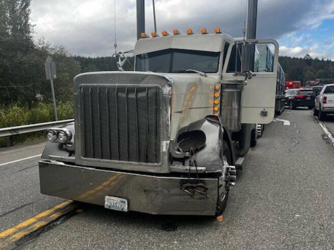 Photo courtesy Chris Turner, Clallam County Fire District 3/ A semi-truck driver is uninjured after an SUV allegedly failed to yield while turning west onto U.S. Highway 101 from 7 Cedars Casino on Oct. 4. The SUV’s passenger was flown to Harborview Medical Center, and the driver was taken to Olympic Medical Center in Port Angeles and later arrested under suspicion of driving under the influence, reports Washington State Patrol.