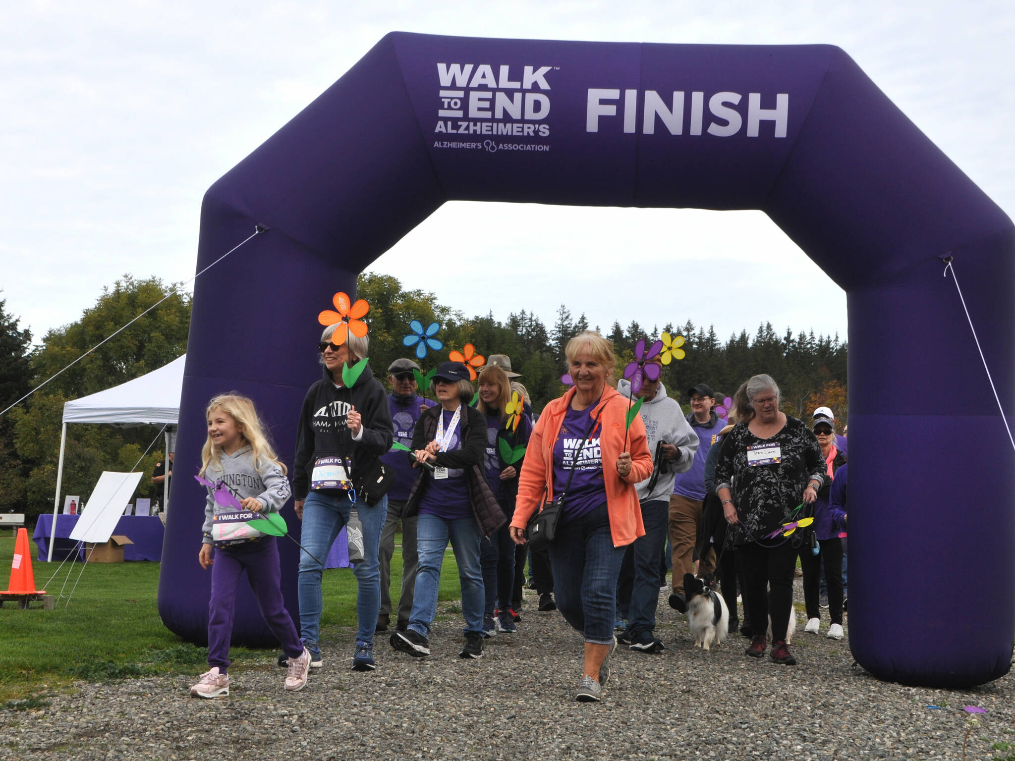 Sequim Gazette photos by Matthew Nash
Walkers begin the Walk to End Alzheimer’s event in Carrie Blake Community Park on Oct. 5. Organizers estimate they raised about $35,000 so far for research and support services for Alzheimer’s disease. Donations can still be made at act.alz.org/nop.