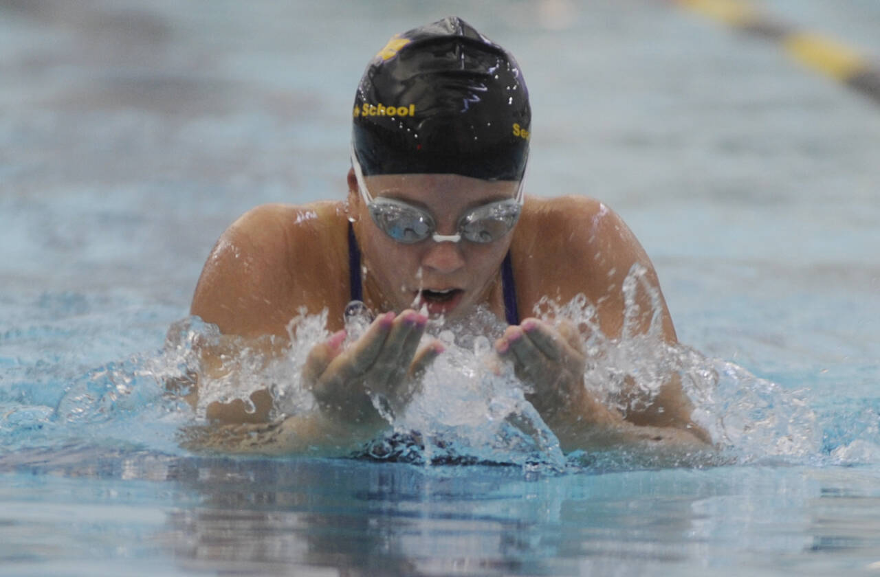 Sequim Gazette photo by Michael Dashiell / Sequim’s Annie Ellefson competes in the breaststroke portion of the 200 medley relay in the Wolves’ Oct. 9 home meet against East Jefferson. Sequim won the event in 2:11.69.