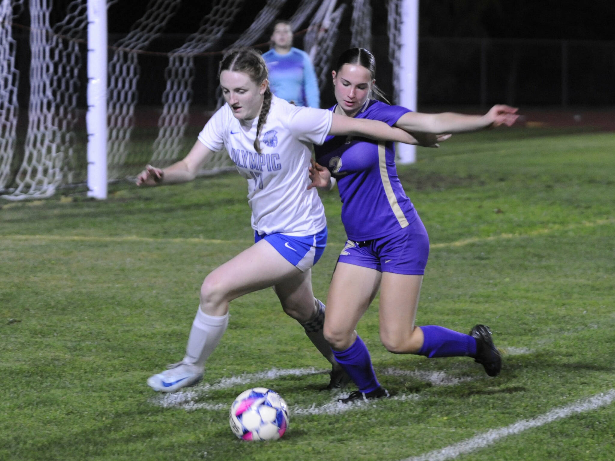 Sequim Gazette photos by Matthew Nash
Sequim’s Olive Bridge (2) , right and Olympic’s Kaylee Cushman (17) fight for the ball during a varsity matchup on Oct. 17 in Sequim. The Wolves won 5-0.