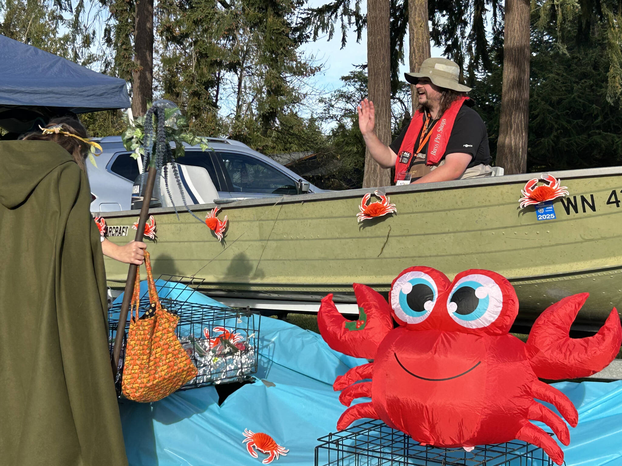 Giovanni Cerutti greets trick-or-treaters from his boat float during the Sequim Prairie Grange’s Fall Festival and Trunk-or-Treat on Oct. 26.