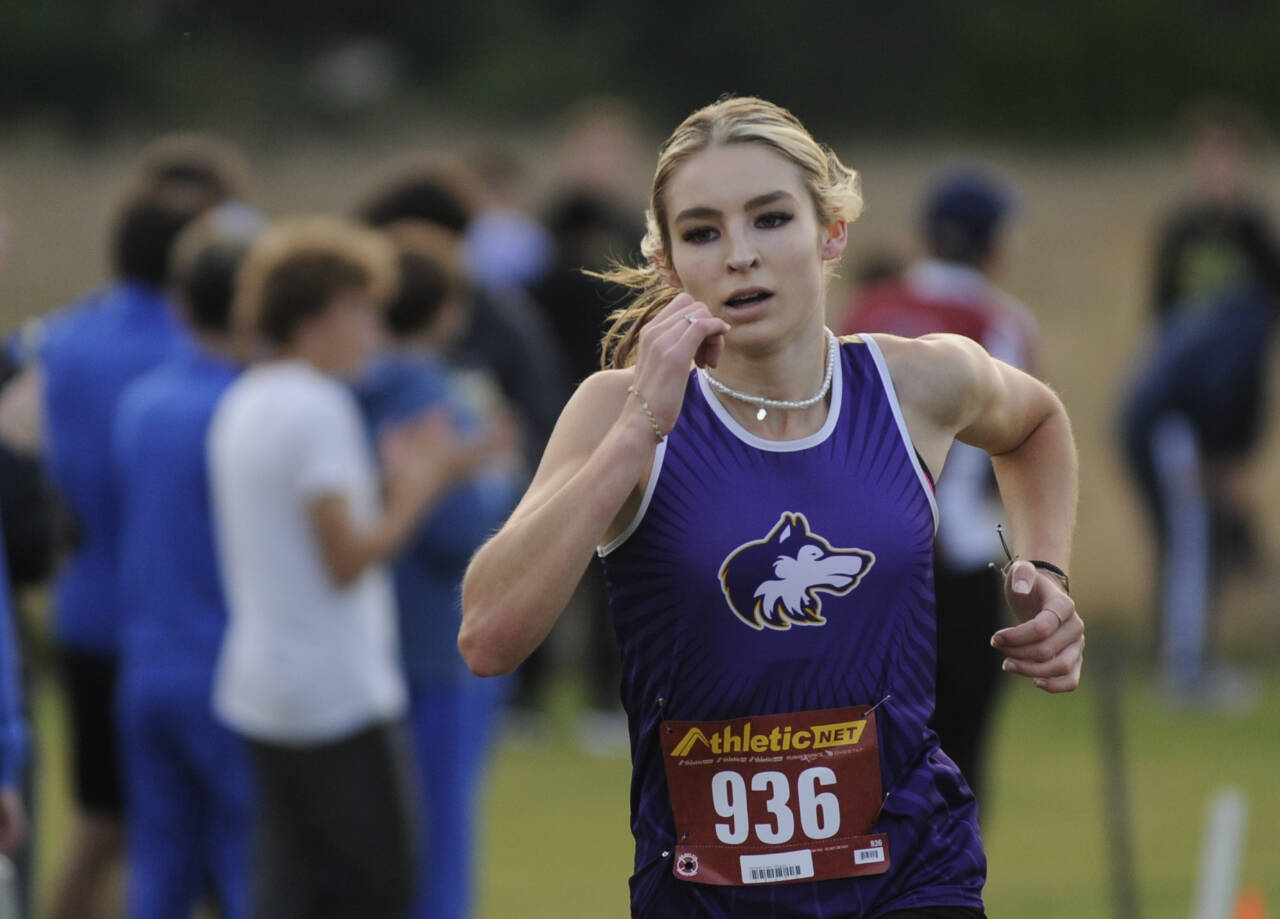 Sequim Gazette photo by Michael Dashiell / Sequim’s Dawn Hulstedt races to a fourth-place finish at the Olympic League cross country championships on Oct. 24, held at The Cedars at Dungeness golf course.