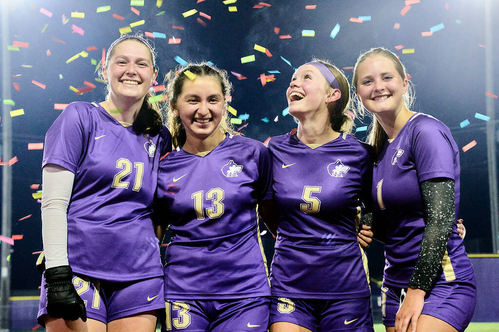 Photo by Daniel James / Sequim High girls soccer’s four seniors celebrate a big win over Bremerton (13-1) on Oct. 29. Pictured, from left, are Amara Gonzalez, Kalli Grove, Ivy Barrett and Libby Turella.